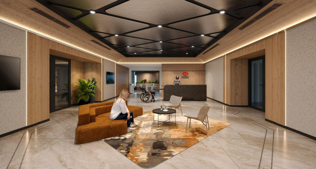 Main reception render: mosaic geometric ceiling in dark stone over wood panelling, HSBC brand mark on backwall, marble flooring with inlaid pattern, mustard soft seating.